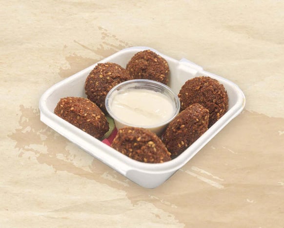 Round crispy falafel serve with garlic sauce
